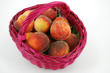 peach fruit in basket