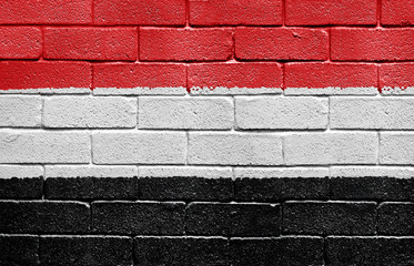 Wall Mural - Flag of Yemen on brick wall