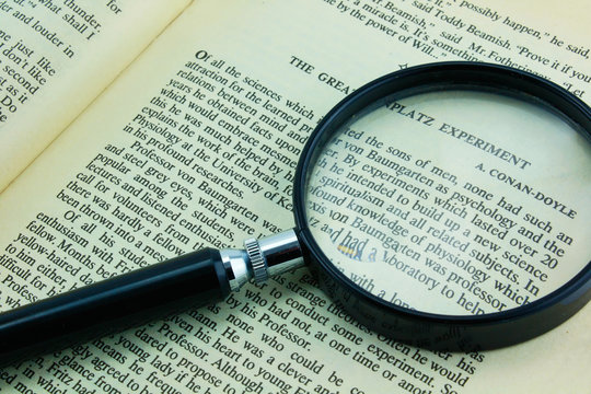 Part of a text and a glass