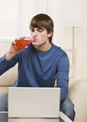 Attractive male drinking