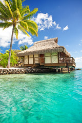 Wall Mural - over water bungalow with steps into lagoon