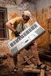 © Anton Gvozdikov - Musician plays a synthesizer