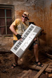 © Anton Gvozdikov - Musician plays a synthesizer