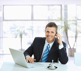 Poster - Businessman talking on mobile phone