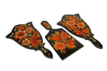 Wall Mural - Three Russian black cutting board painted with flowers isolated