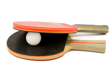 Two Table Tennis Bats And A Ping Pong Ball