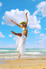 Wall Mural - Woman enjoying the sea