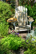 Weathered Chair And Hat In Picturesque Garden Scene