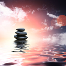 Zen Stones Reflecting In Water Background