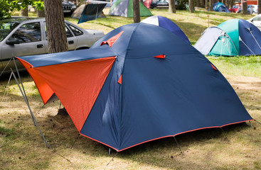 blue tent with red entrance
