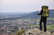 canvas print picture - hiker over the city