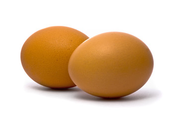 Two eggs isolated on white background