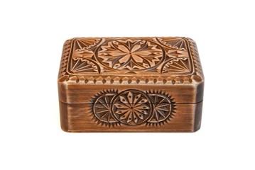 Closed carved wooden casket isolated