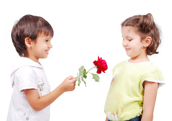 Wall Mural - Very cute scene of two little children with rose