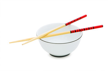 Bowl and chopsticks isolated on the white