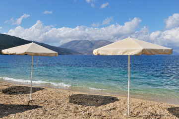 Wall Mural - landscape with  beach and parasols