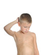© jordano - A young boy thinking hard about something.