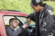 © Monkey Business - Young Man Dealing Drugs From Car