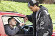 © Monkey Business - Young Man Dealing Drugs From Car