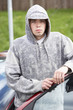 © Monkey Business - Young Man Standing Next To Car