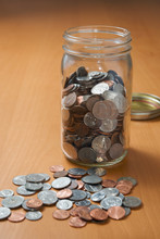 Saving Coins In Jar