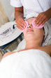 © Dmitrijs Dmitrijevs - Young woman getting skin cleaning at beauty salon (shallow dof)
