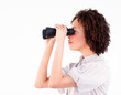 © WavebreakMediaMicro - Portrait of attractive businesswoman using binoculars