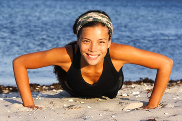 Wall Mural - Woman doing push-ups