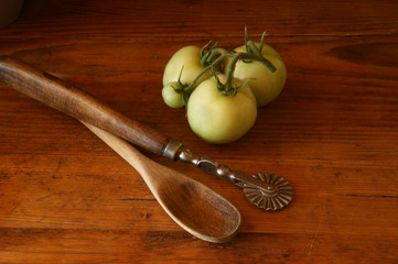 fresh green organic tomatoes on a dark background