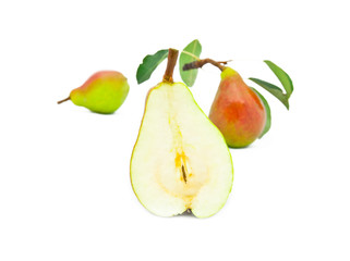 Ripe bright pears with leaves on a white background