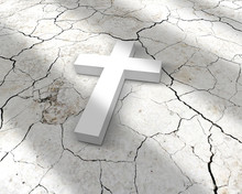 White Cross Lying On Cracks