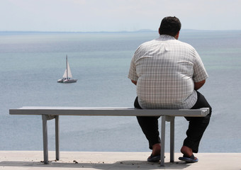 A man sitting on the bench