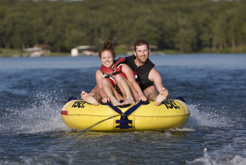 Tubing fun on a lake