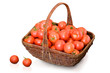 Fresh tomatoes in woven basket 