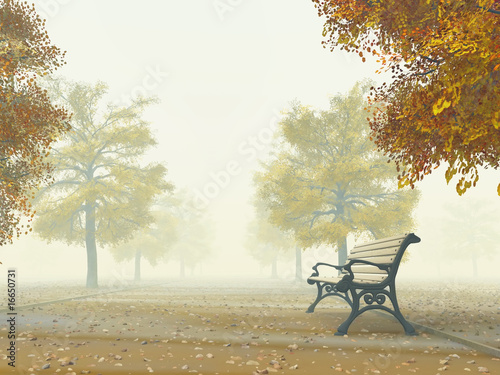 Fototapeta na wymiar lonely bench on autumn path