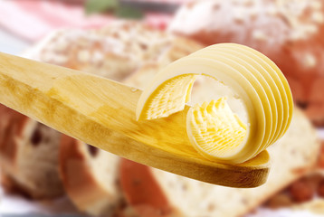 Poster - Butter curl on a wooden spoon