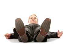 Businessman Laying Down In A Suit