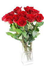 Red Roses In A Glass Vase Isolated