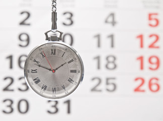 Fototapete - Closeup clock and calendar