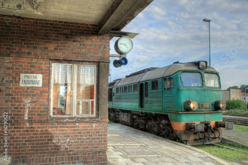 Fototapeta na wymiar Diesel locomotive standing at the station platform