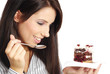 © ZoomTeam - Woman eating cake