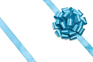 gift packaging with blue ribbons and bow