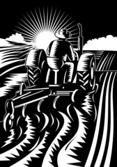 Wall Mural - Farmer on tractor plowing field