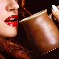 Wall Mural - Woman drinking a drink