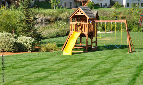Back Yard Wooden Swing Set Stock Photo | Adobe Stock