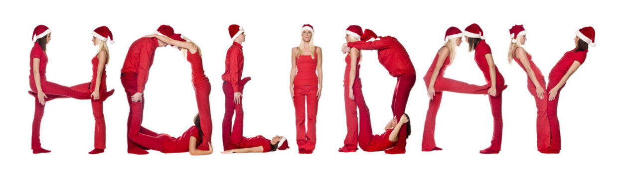 Group of red dressed people forming the word 'HOLIDAY'