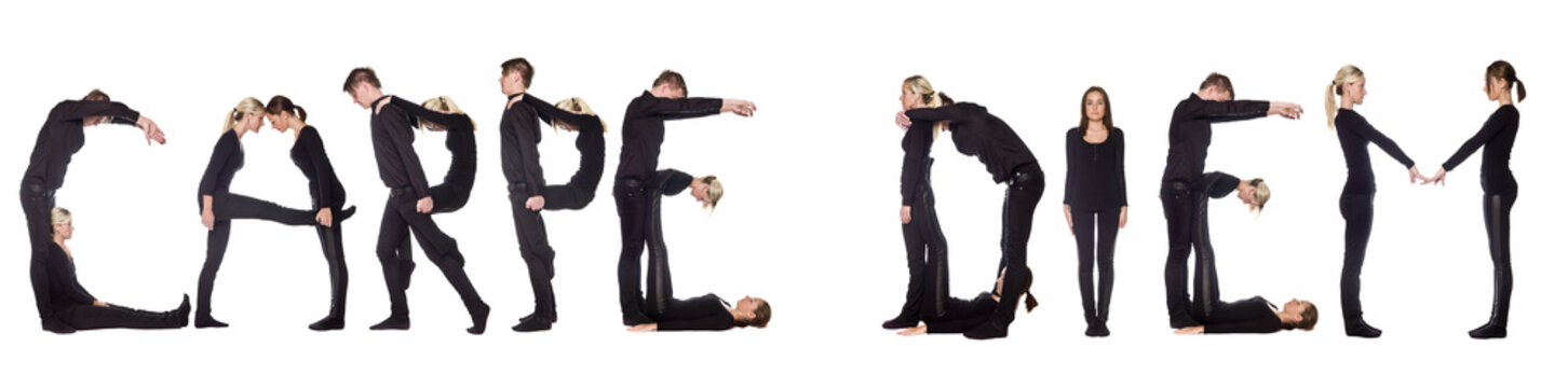 Group of people forming the phrase 'CARPE DIEM'