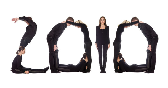 Group of people forming the word '2010'