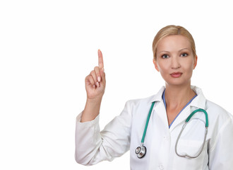 Closeup of a young  female doctor pointing  finger upwards