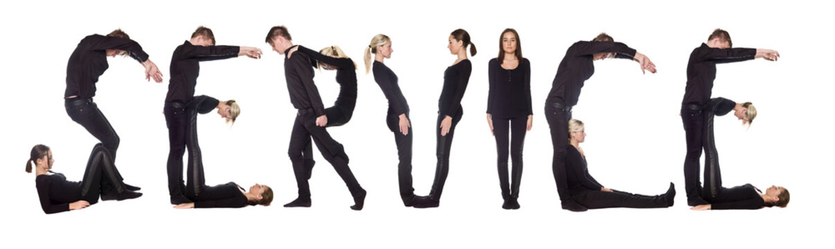 Group of people forming the word 'SERVICE'